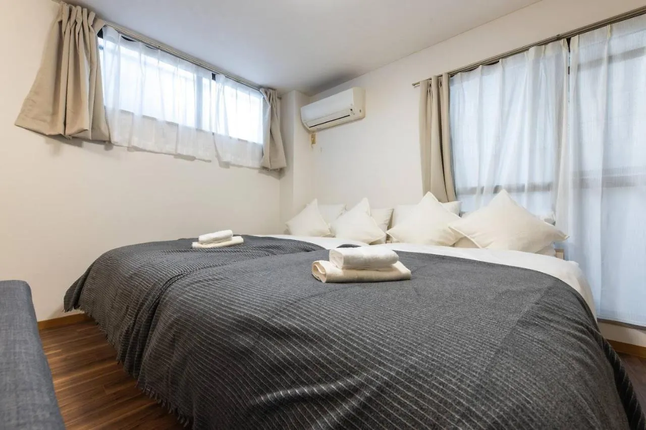Ferienwohnung ユニオン新大阪 十三駅西中島南方駅 自転車&Wifi貸出無料 Apartment Ōsaka