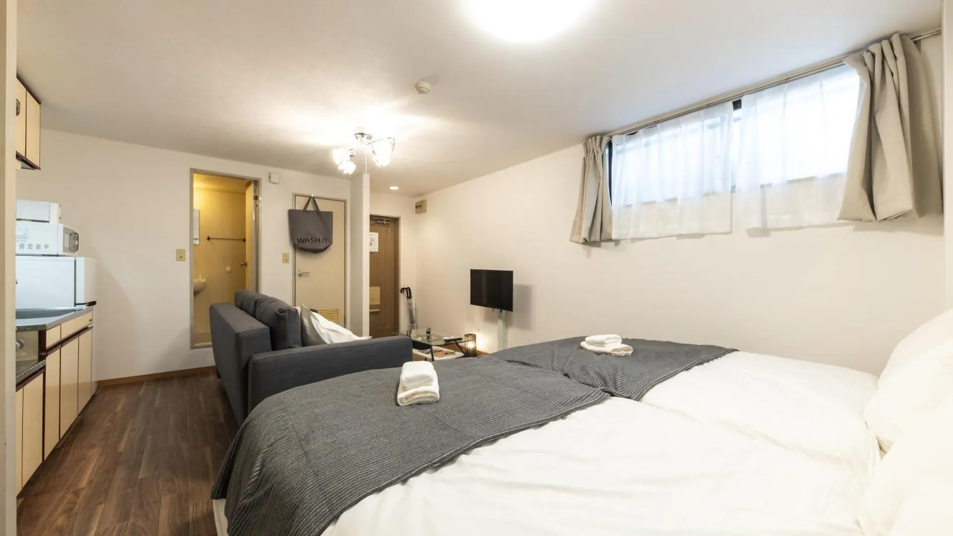 Ferienwohnung ユニオン新大阪 十三駅西中島南方駅 自転車&Wifi貸出無料 Apartment Ōsaka